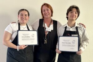 TOP Awards Scholarships to Two High School Volunteers